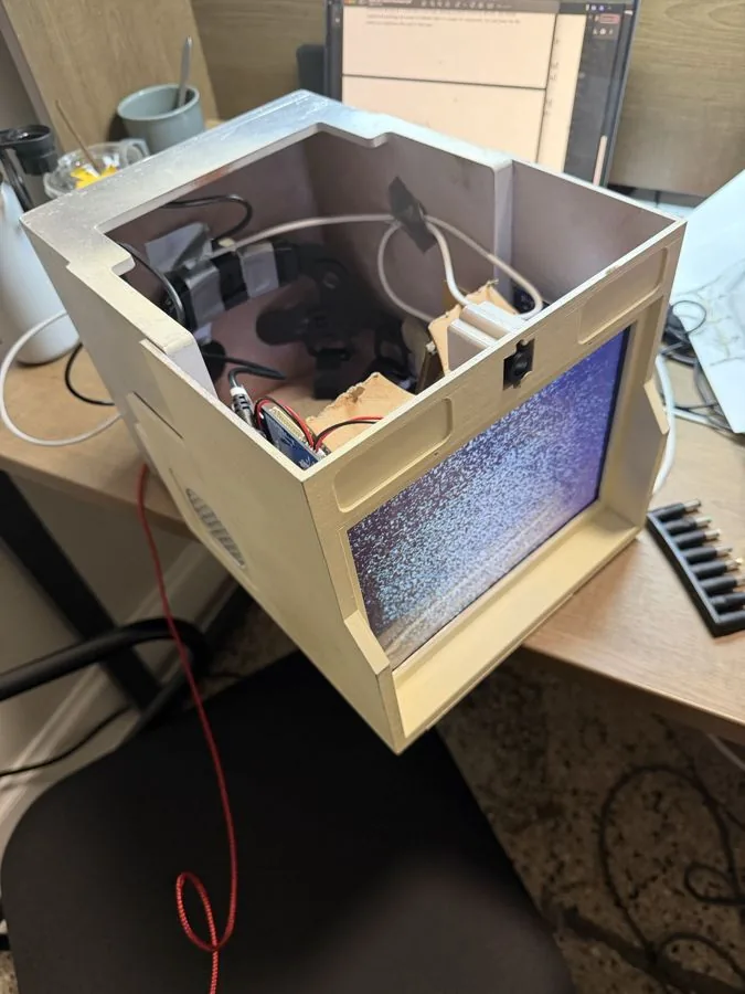 Custom-printed housing with the outward-facing display powered on